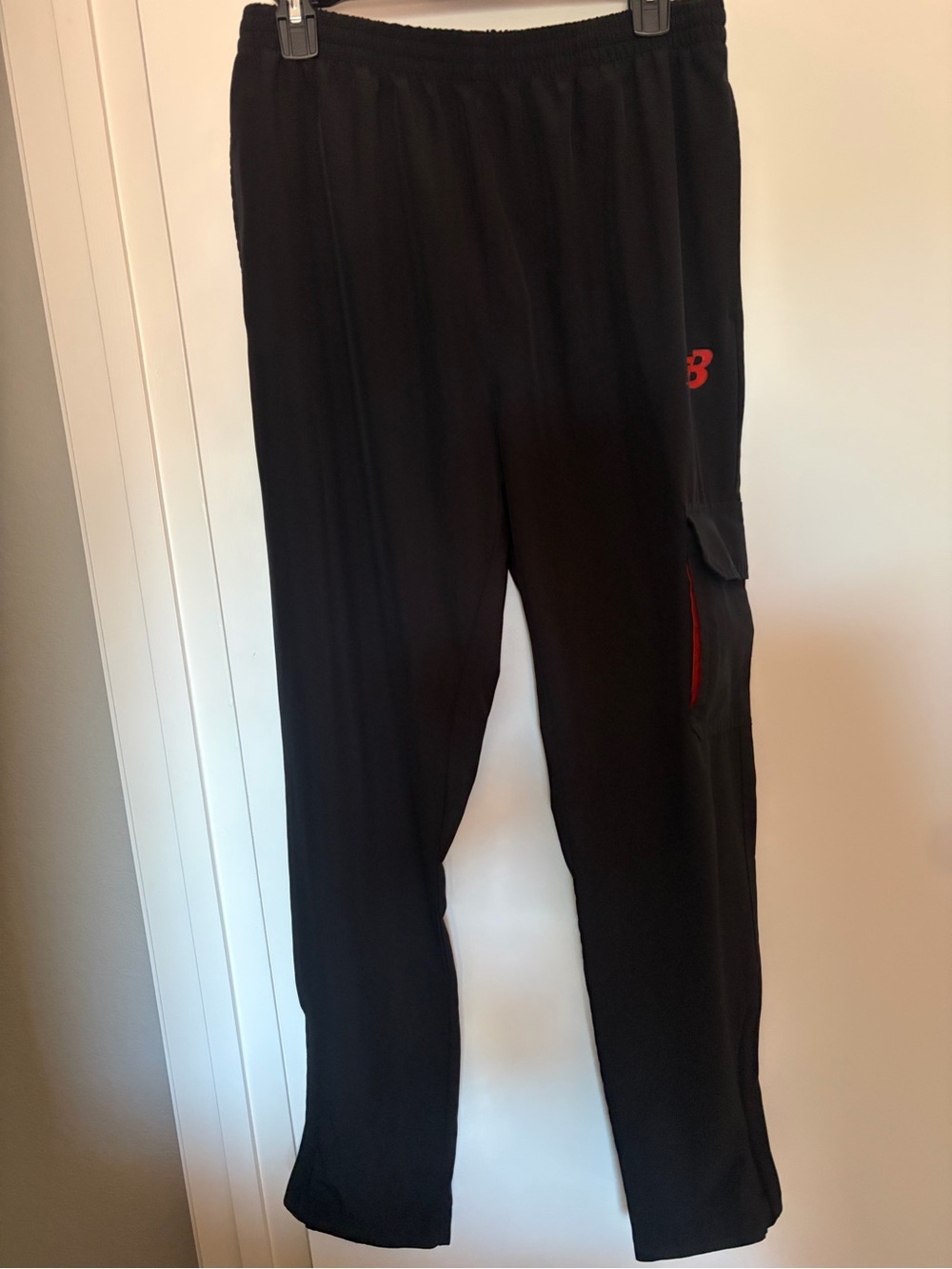 New Balance Black Jogger Pants with Red Logo Accent
